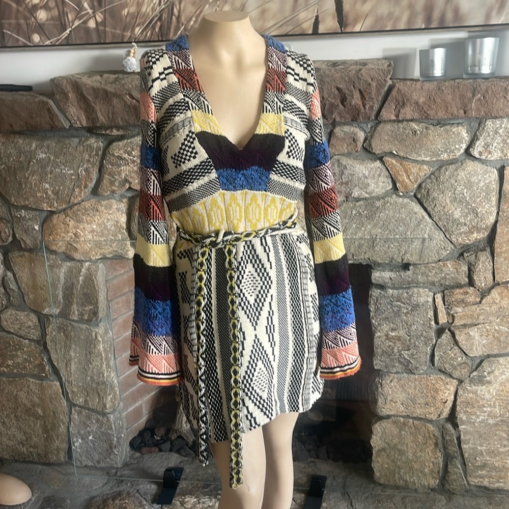 Dress by Free People.